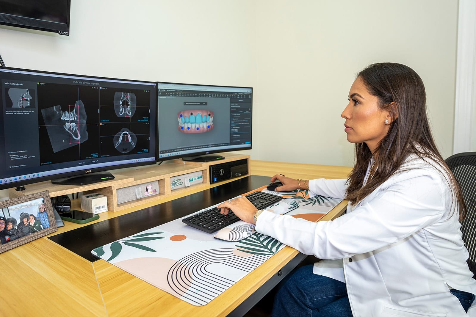 Dr. Rodriguez working on some scans on her computer