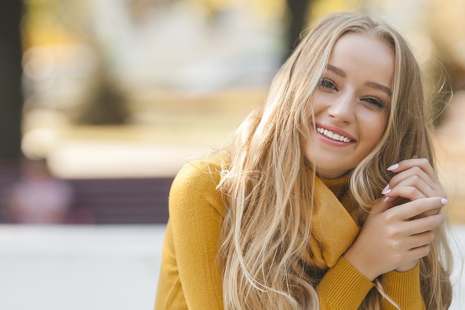 Close up portrait of young beautiful woman outdoors